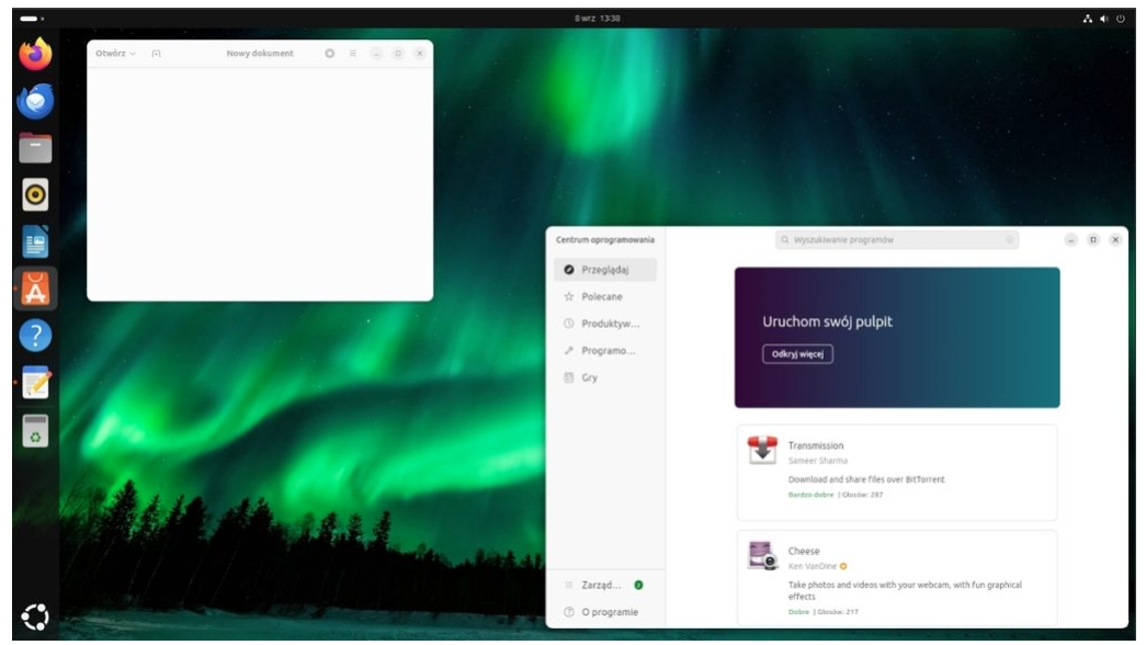 Linux Ubuntu oraz jedna ze standardowych tapet.